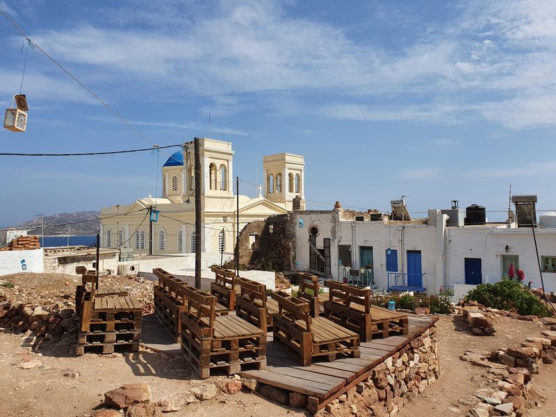 The ruins of the Kastro and new buildings present a curious mix