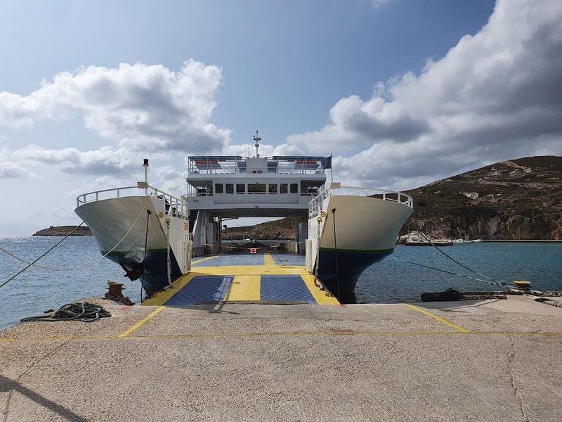 The double-ended local ferry between Milos and Kimolos with its car ramp lowered at the quay