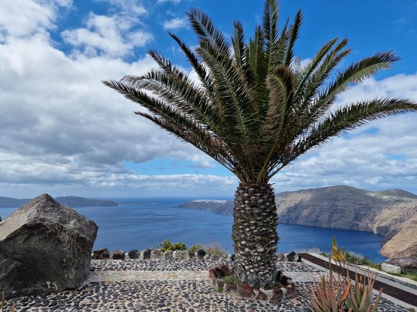 The Santorini caldera with the white village of Oia perched along the cliff rim in the distance