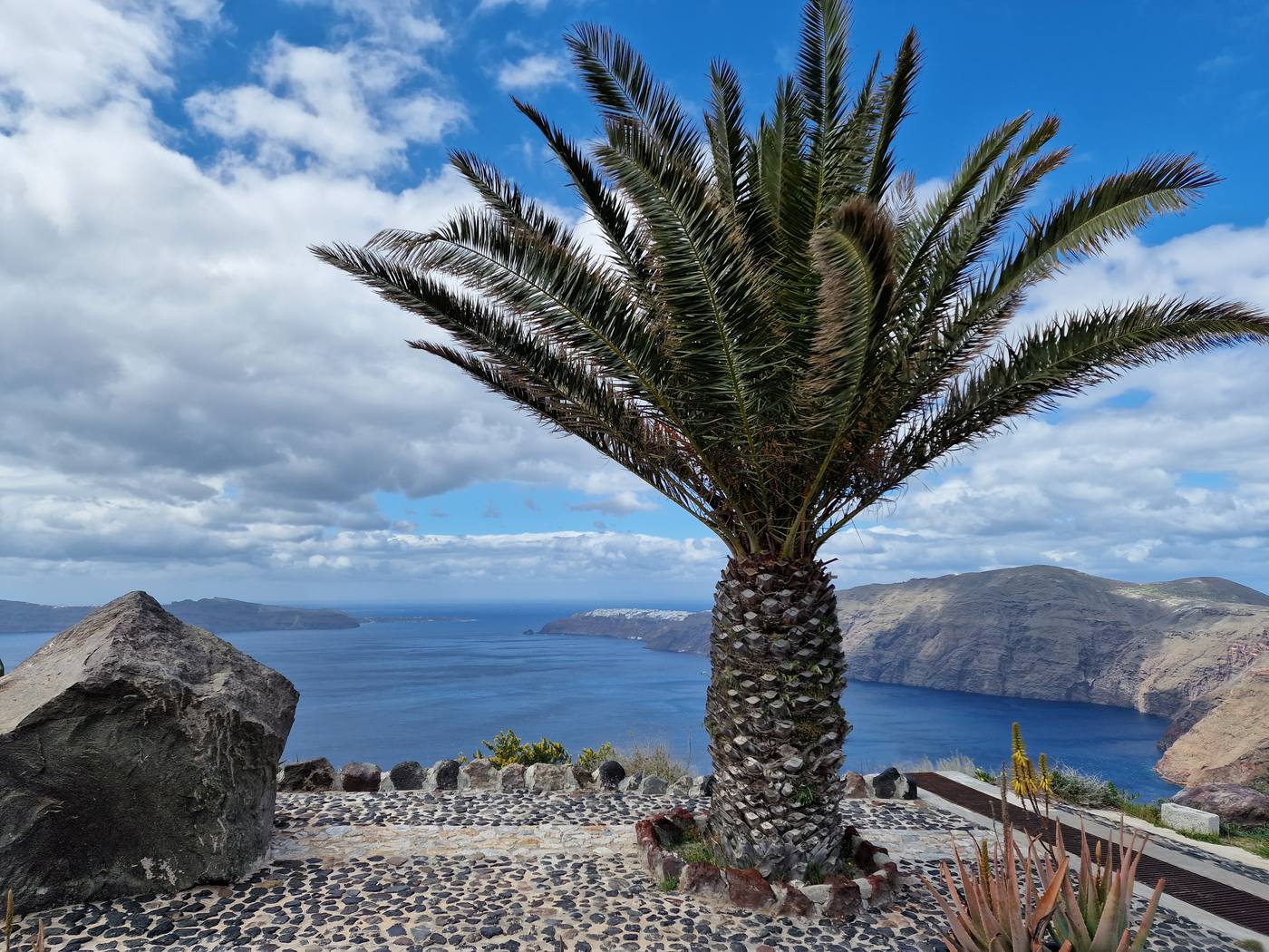 The Santorini caldera with the white village of Oia perched along the cliff rim in the distance